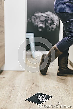 Small black board drawed on a wooden floor indoor scene Stock Photo