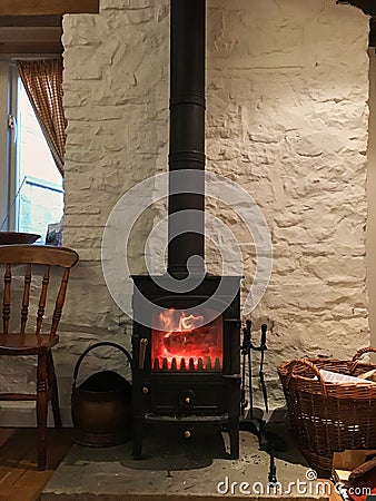 small black fireplace in house white walls Stock Photo