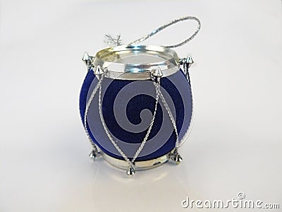 Small blue drum. Toy on white background. Stock Photo