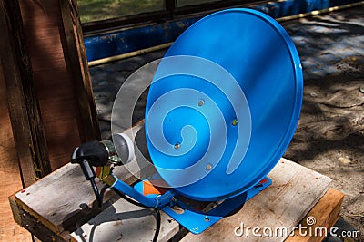 small blue satellite dish Stock Photo