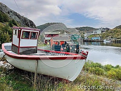 Small boat near the harbor of Quidi Vidi in St John`s Stock Photo