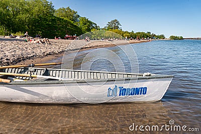 Small boat with Toronto city logo mooring at the Centre island beach 2019 Editorial Stock Photo