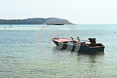 Fisherman boat floating on ocean Stock Photo