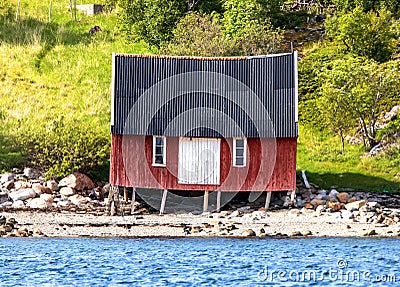 Boathouse by sea Stock Photo