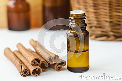 Small bottle with essential cinnamon oil. Aromatherapy, natural skin care Stock Photo