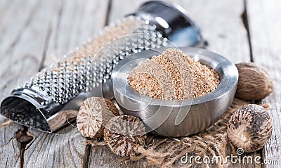 Small bowl with Nutmeg Powder Stock Photo