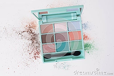 A small box of eyeshadow colors with an application brush Stock Photo