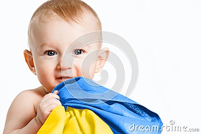 A small boy with national symbols in his hand. Ukrainian flag. Russia& x27;s invasion of Ukraine, Children against the Stock Photo