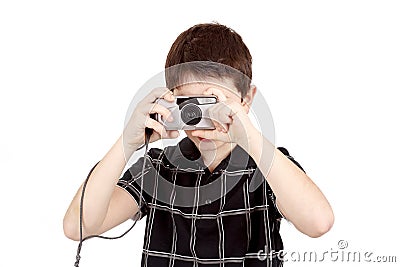 Small boy photographing horizontal with digital camera Stock Photo