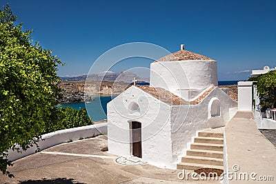 Small brick chapel with a cross. A tiny church on the waterfront. Editorial Stock Photo