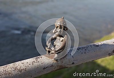 Small bronze statue of Celt attached in Mukachevo Ukraine photo, May 1, 2017. Editorial Stock Photo