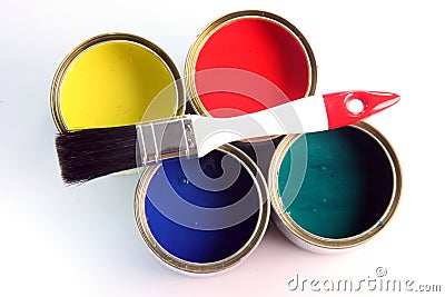 Small brush on paint cans Stock Photo