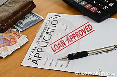 Small business loan application lies on the table Stock Photo