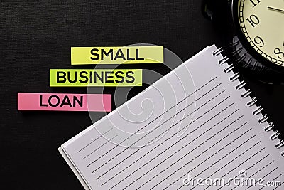 Small Business Loan text on top view office desk table of Business workplace and business objects Stock Photo