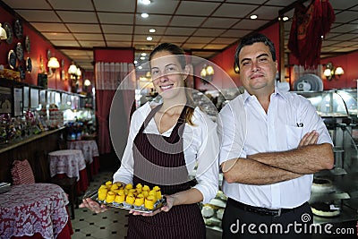 Small business: owner of a cafe and waitress Stock Photo