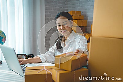 Small business owner, woman checking purchase order in mobile ph Stock Photo