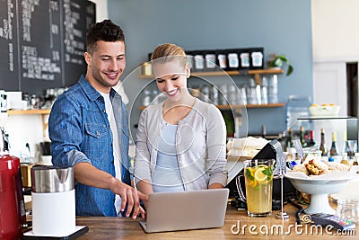 Small business owners in coffee shop Stock Photo