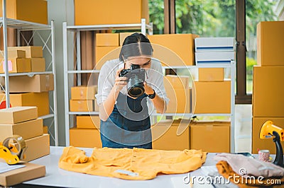 Small business owners online are taking pictures of their products and offering them to customers who will place their orders. - Stock Photo