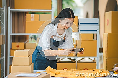Small business owners online are taking pictures of their products and offering them to customers who will place their orders. - Stock Photo