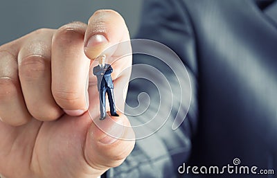 Small businessman in hand Stock Photo