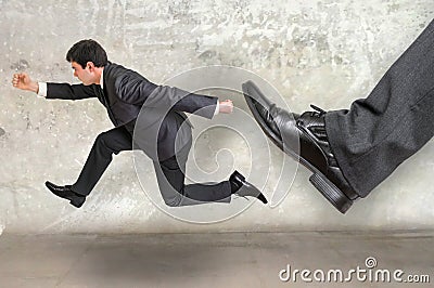 Small businessman running away from a boss pressure Stock Photo