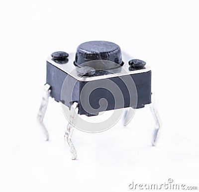 Small button for electronic devices and arduino kits isolated on white background. Stock Photo