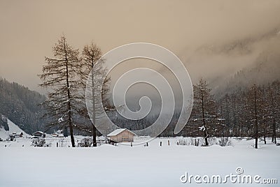 Small cabin in Mountain Valley Stock Photo