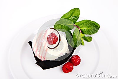 Small cake with rasberry and mint Stock Photo
