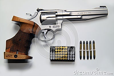 Small caliber Smith and Wesson revolver sports weapon with associated ammunition Editorial Stock Photo