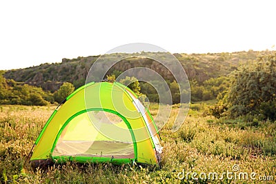 Small camping tent in wilderness Stock Photo