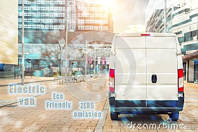 Small cargo electric delivery van driving in european city central district. Zero emission eco-friendly lorry minivan courier Stock Photo