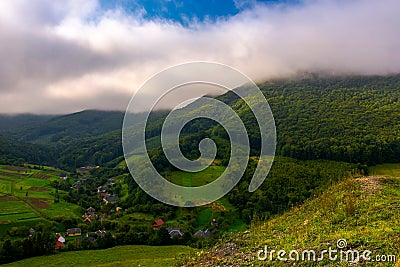 Small Carpathian village in mountains Stock Photo