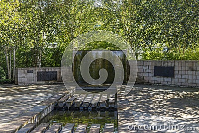A small cascade fountain outside in David Welch Winter gardens in Duthie Park, Aberdeen Stock Photo