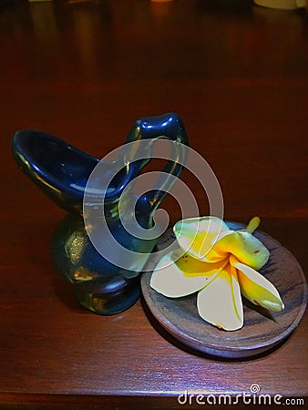 Small ceramic with frangipani flowers Stock Photo
