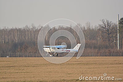Small Cessna plane landing Editorial Stock Photo