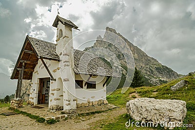 Small chapel in Falzarego pass in Dolomites Stock Photo