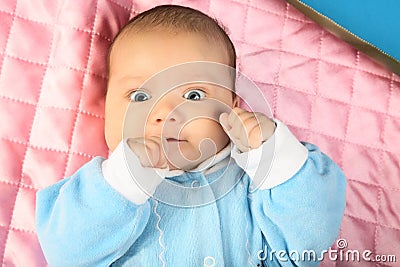 The small child having shrink cams lies Stock Photo
