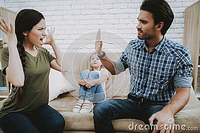 Small Child Suffers from Family Quarrels at Home. Stock Photo