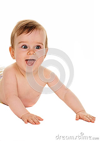 Small children in diapers baby lies on the ground Stock Photo