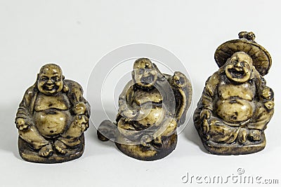 Small 3 chinese monk figures which are peace, health, happiness Stock Photo