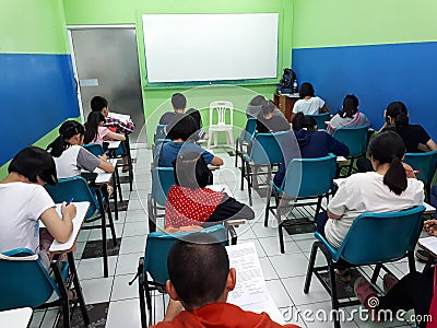 A small class of a tutorial school Editorial Stock Photo
