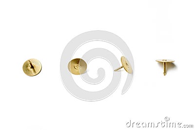 Small Collection Of 4 Brass Thumbtacks Arranged In A Line On White Background Stock Photo