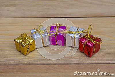 Small colored gifts on the table. Stock Photo