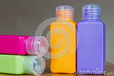 Small colored plastic bottles for traveling Stock Photo