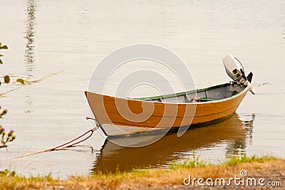 Small, colorful, fishing dory. Stock Photo