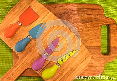 Small Colorful Set of Kitchen Cuterly on a Board For Kids, Various type of Knife Stock Photo