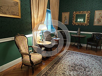 A corner in a room in the Iulia Hasdeu palace with a orange couch Editorial Stock Photo