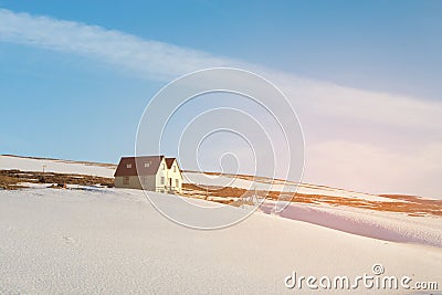 Small cottage over mountain slope with snow covered Stock Photo