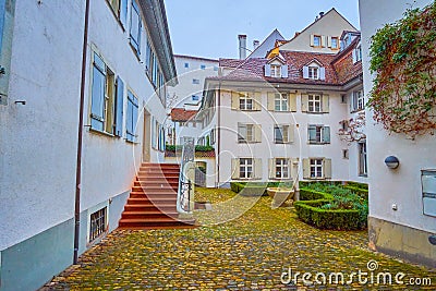 The small courtyard with small ornamental garden in historical part of Basel, Switzerland Stock Photo