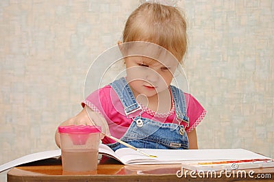 Small cute painting girl Stock Photo